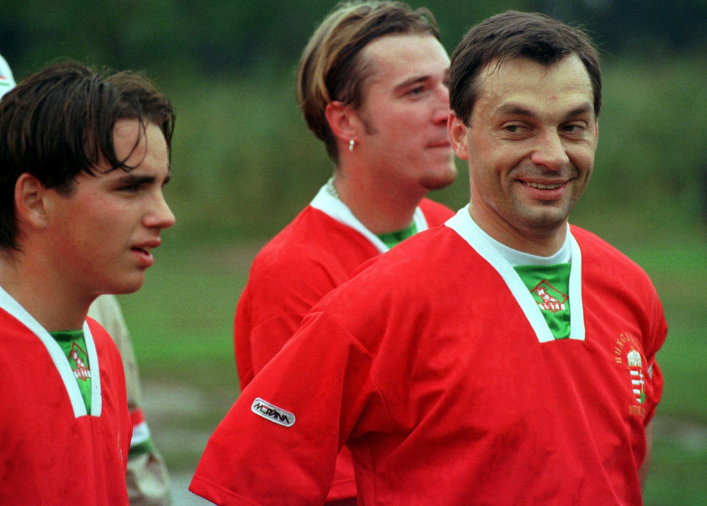 FILE -New Hungarian Prime Minister Dr. Viktor Orban smiles at fellow teammates at the end of the first half of play during a scrimage played at the Hungarian Sports Club in Woodbridge, N. J., Oct. 10, 1998. (AP Photo/Michael J.Treola, File)
