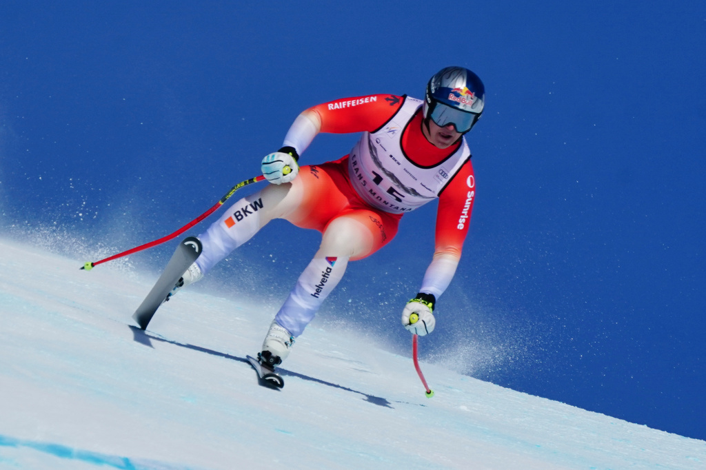 Switzerland's Franjo von Allmen speeds down the course during an alpine ski, men's World Cup downhill, in Crans Montana, Switzerland, Sunday, Feb. 1, 2026. (AP Photo/Pier Marco Tacca)