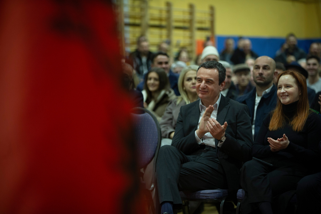 Leader of the VV (Selfdetermination) political party, Albin Kurti applauds during election rally in the capital Pristina on Wednesday, Dec. 24, 2025. (AP Photo/Visar Kryeziu)