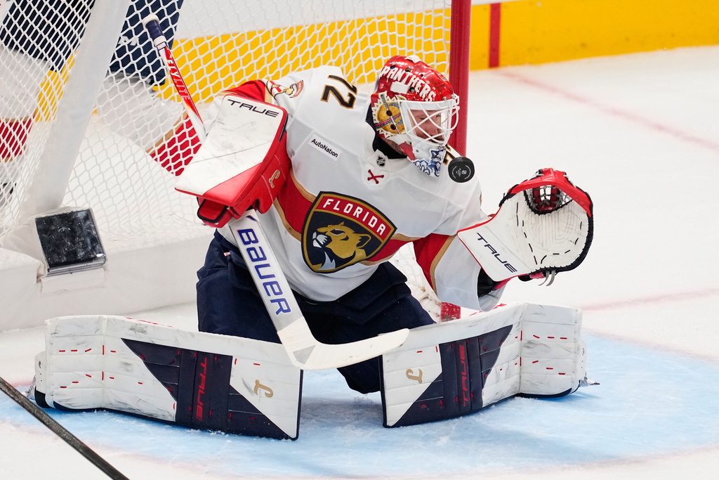 Florida Panthers goaltender Sergei Bobrovsky defends against a shot by the Dallas Stars in the first period of an NHL hockey game in Dallas, Saturday, Dec. 13, 2025. (AP Photo/Tony Gutierrez)