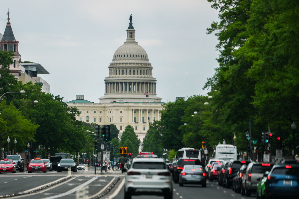 The U.S. Capitol is seen as cars drive on Pennsylvania Avenue, during rush hour, Wednesday, May 13, 2026, in Washington. (AP Photo/Julia Demaree Nikhinson)