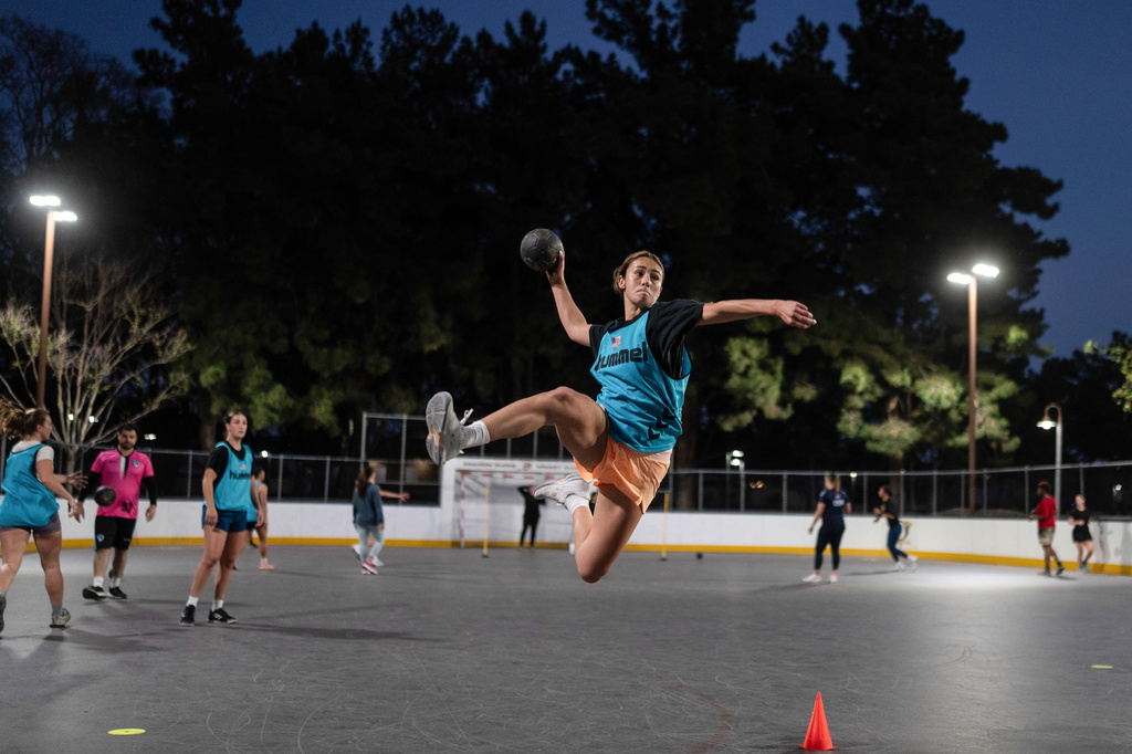 Devyn Holbrook takes a jump shot during a handball training session in Tustin, Calif., Wednesday, March 25, 2026. (AP Photo/Jae C. Hong)