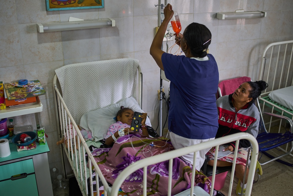 Carolina Silva Matos, a cancer patient, rests in a hospital bed at the National Institute of Oncology and Radiology in Havana, Cuba, Friday, Feb. 20, 2026. (AP Photo/Ramon Espinosa)