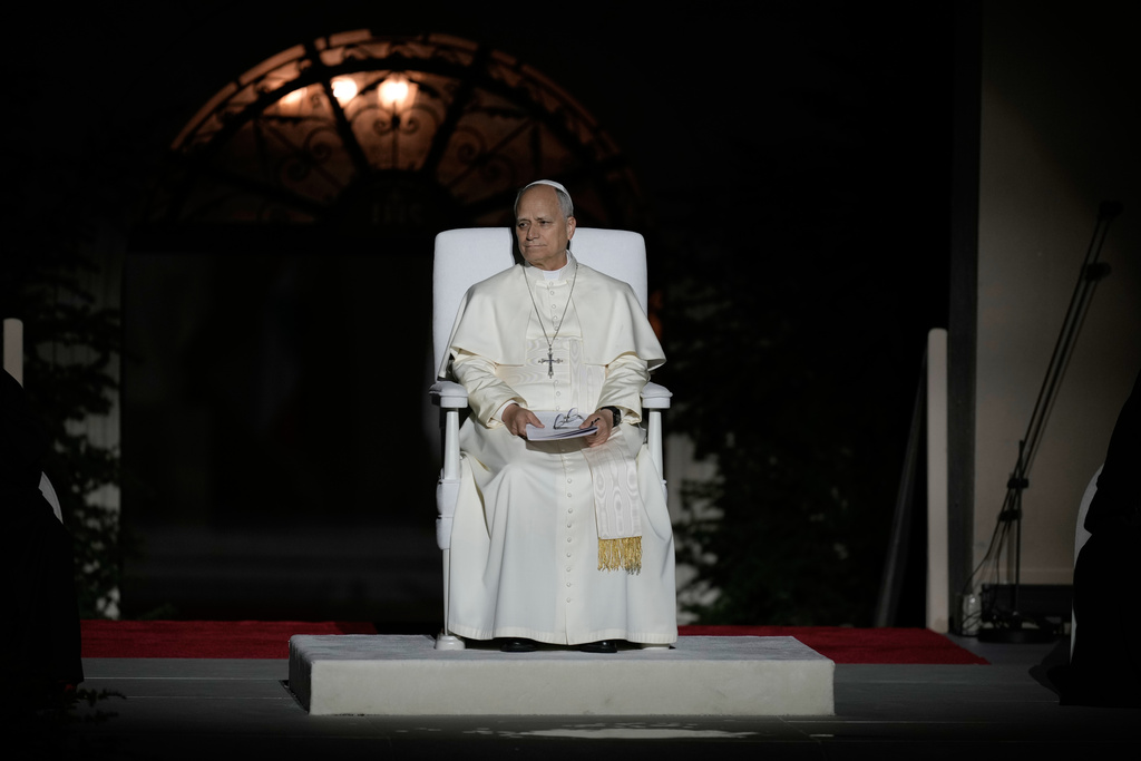 Pope Leo XIV sits onstage during a meeting with youths in Bkerki, the seat of the Maronite Church, in Lebanon, Monday, Dec. 1, 2025. (AP Photo/Bilal Hussein)