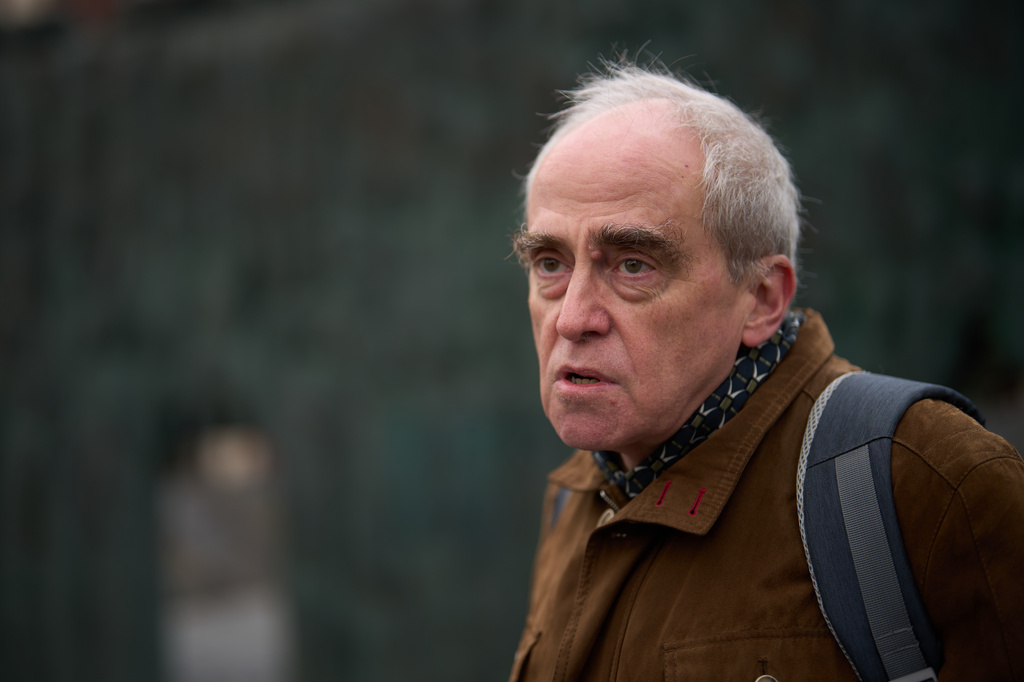 Jan Raczynski, chair of the International Memorial entity that was liquidated in Russia in 2021, speaks during his interview with the Associated Press in front of the Wall of Grief memorial to the victims of Soviet repressions in Moscow, Wednesday, April 8, 2026. (AP Photo/Alexander Zemlianichenko)