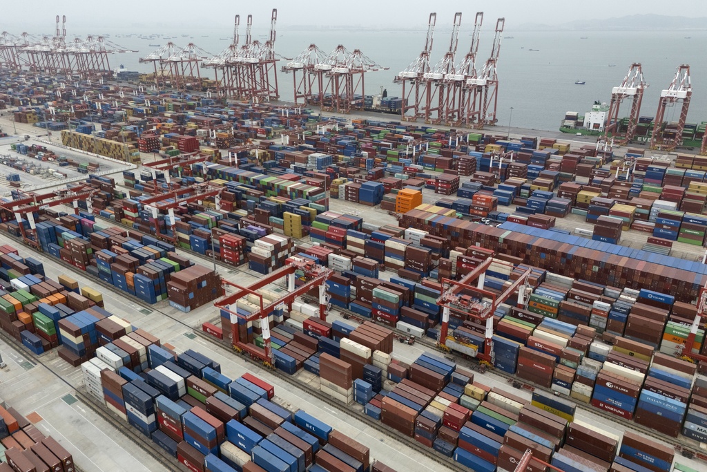 FILE - Shipping containers are ready for transport at the Guangzhou Port in the Nansha district in southern China's Guangdong province, April 17, 2025. (AP Photo/Ng Han Guan, File)