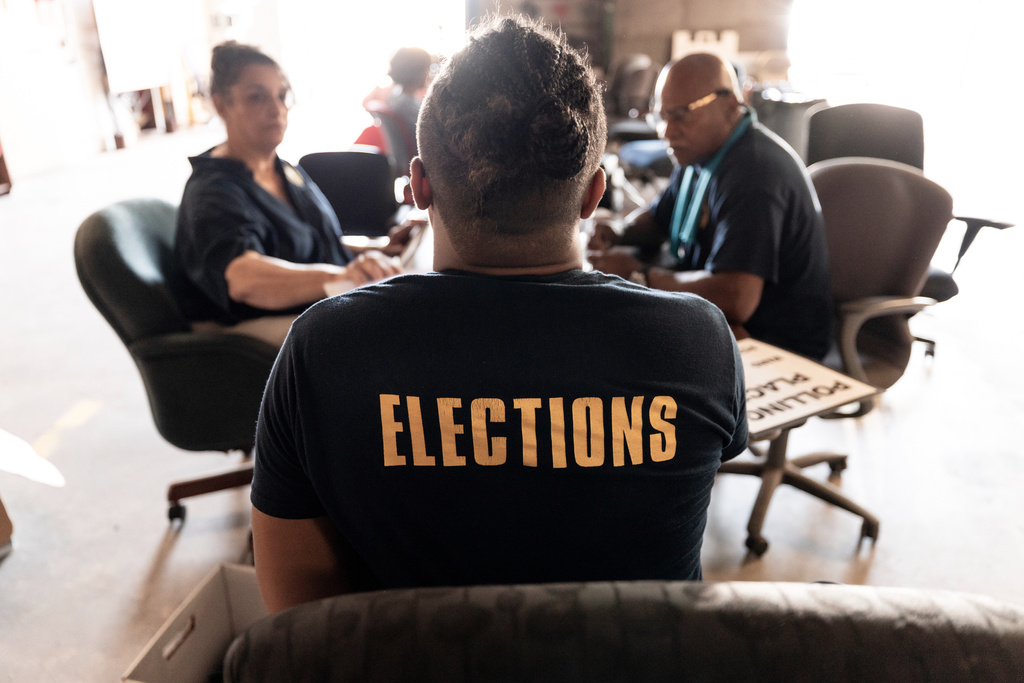 State election staff get voting machines ready on Thursday, May 14, 2026 for Saturday's election in New Orleans. /The Times-Picayune/The New Orleans Advocate via AP)