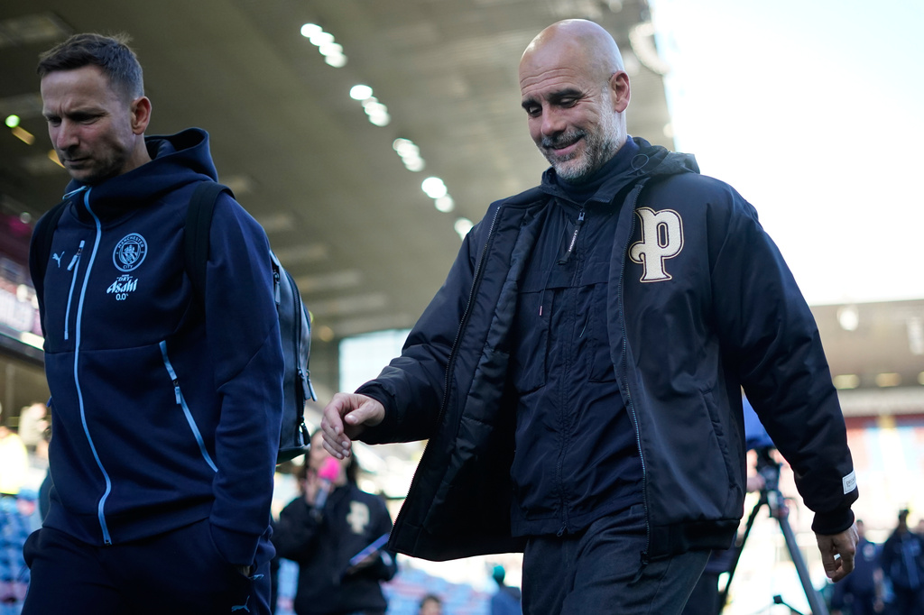 Manchester City's head coach Pep Guardiola arrives fior the Premier League soccer match between Burnley and Manchester City in Burnley, England, Wednesday, April 22, 2026. (AP Photo/Dave Thompson)