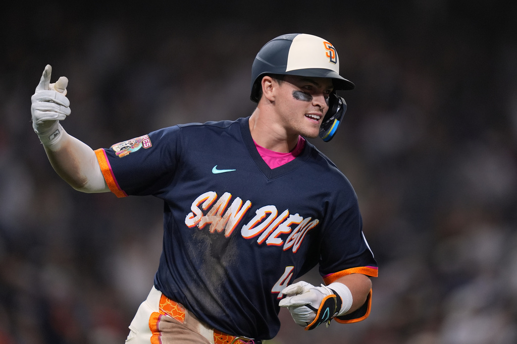 San Diego Padres' Jase Bowen celebrates after hitting a home run during the fourth inning of a baseball game against the San Francisco Giants Friday, July 31, 2026, in San Diego. (AP Photo/Gregory Bull)