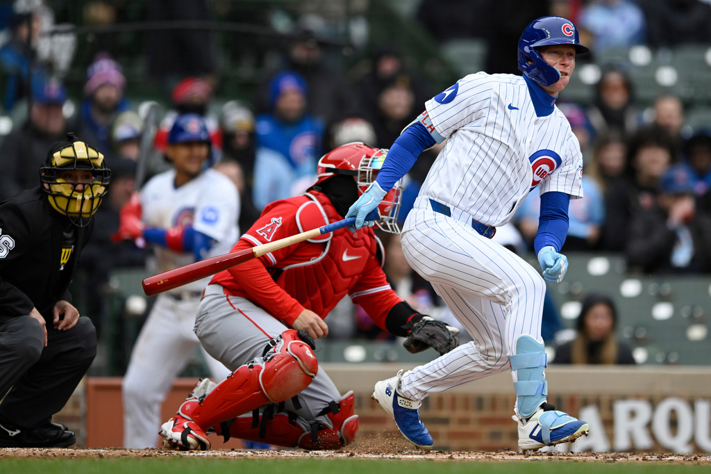 Chicago Cubs' Pete Crow-Armstrong watches his RBI single during the third inning of a baseball game against the Los Angeles Angels in Chicago, Wednesday, April 1, 2026. (AP Photo/Paul Beaty)