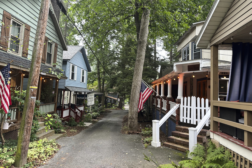 Cottages in the town of Mount Gretna, Pa., shown Wednesday, Aug. 6, 2025, spring to life every summer with people who spend their leisure time engaged in activities such as cooking lessons, nature walks, yoga, professorial lectures, music and plays. (AP Photo/Mark Scolforo)