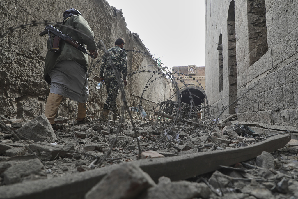 People inspect the damage at the National Museum, following the Israeli airstrikes on Wednesday in Sanaa, Yemen, Thursday, Sept. 11, 2025. (AP Photo/Osamah Abdulrahman)