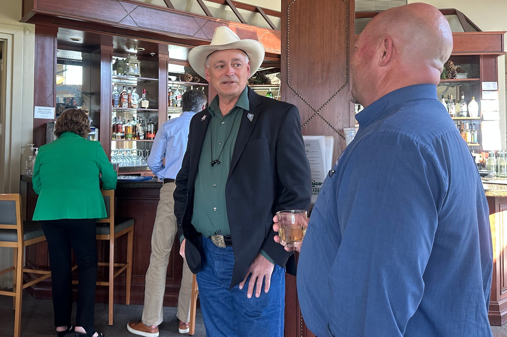 James Settelmeyer, a Republican candidate for Congress in Nevada's 2nd district, speaks to attendees of a Nevada Builders Alliance event in Washoe Valley, Nev., Wednesday, May 20, 2026. (AP Photo/Jessica Hill)