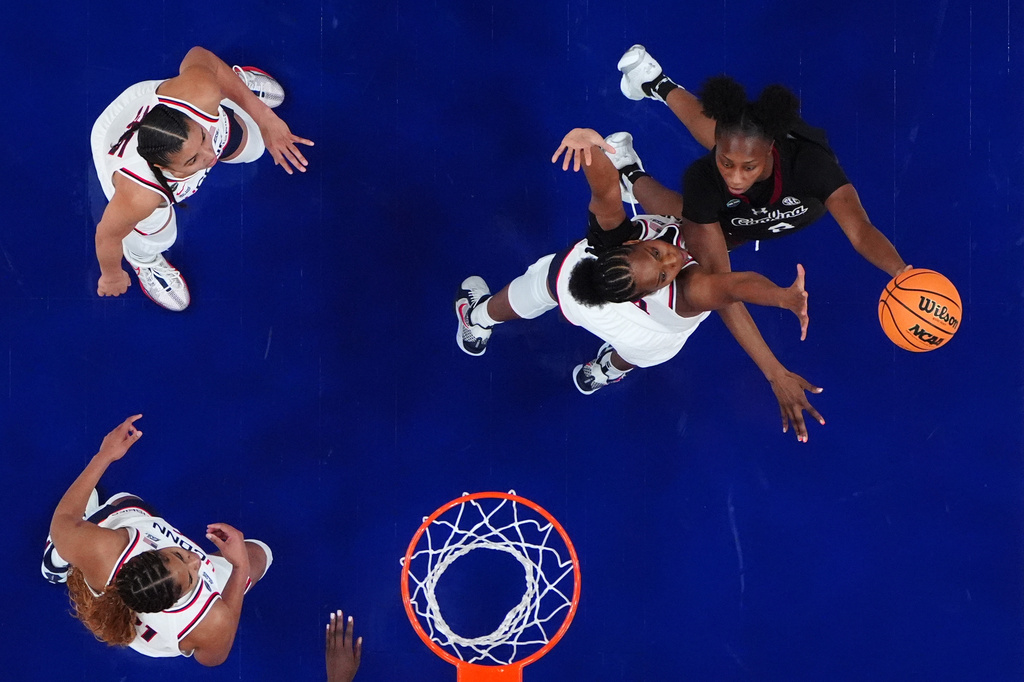 FILE - South Carolina forward Joyce Edwards (8) shoots over UConn guard Blanca Quinonez (4) during the first half of a woman's NCAA college basketball tournament semifinal game at the Final Four, April 3, 2026, in Phoenix. (AP Photo/Ross D. Franklin, File)