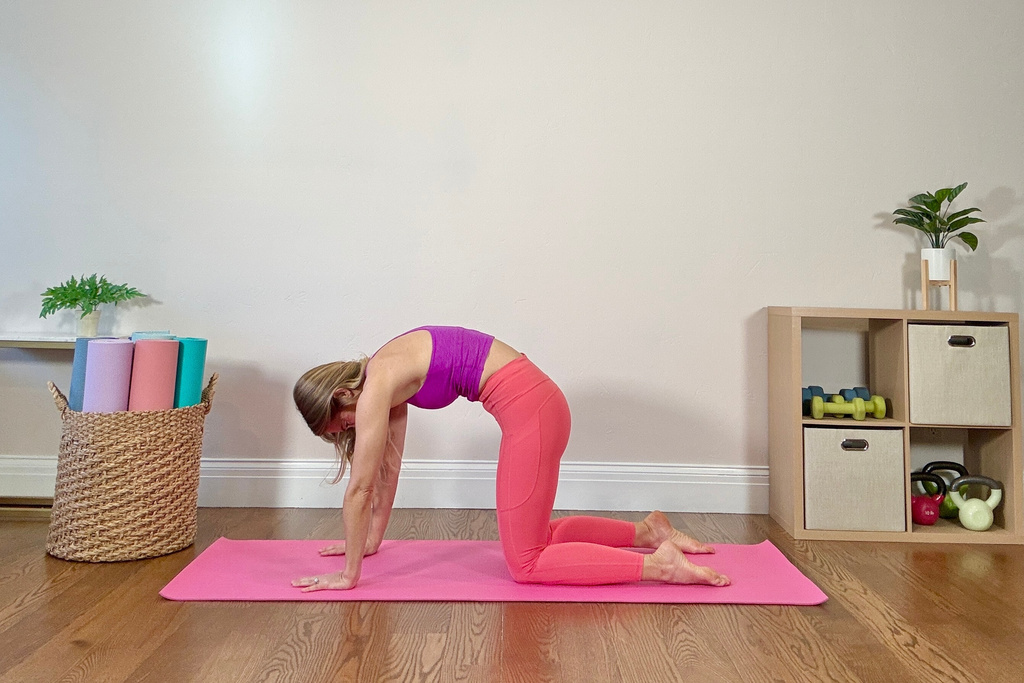 This undated image shows physical therapist and Pilates instructor Jessica Valant demonstrating a stretch movement in Colorado. (Jessica Valant via AP)