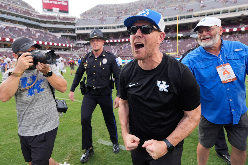 Kentucky head coach Will Stein celebrates after his team beat Texas A&M in an NCAA college football game Saturday, Sept. 19, 2026, in College Station, Texas. (AP Photo/David J. Phillip)