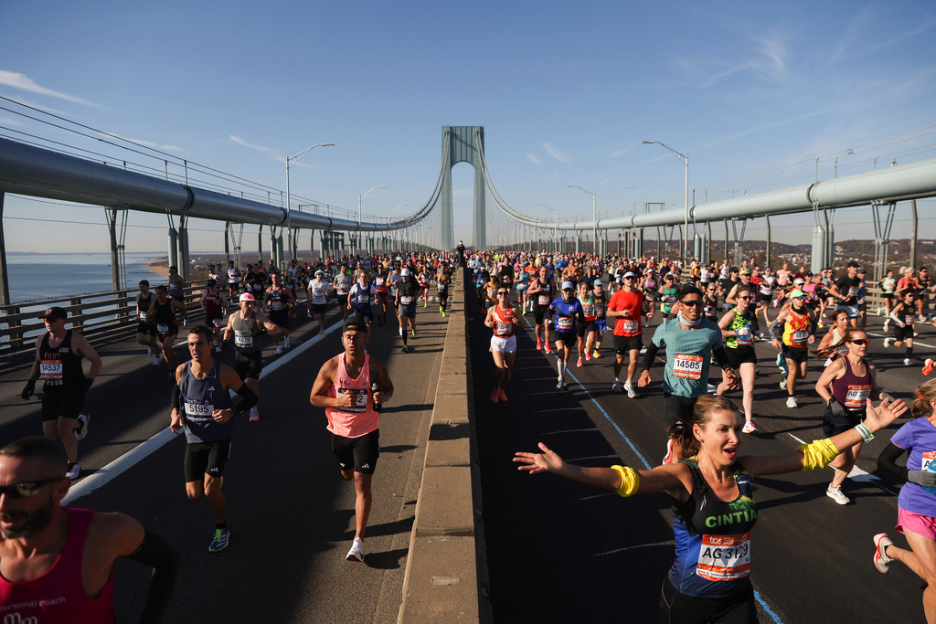 Runners make their way across the Verrazzano Narrows Bridge during the New York City Marathon, Sunday, Nov. 2, 2025, in New York. (AP Photo/Heather Khalifa)