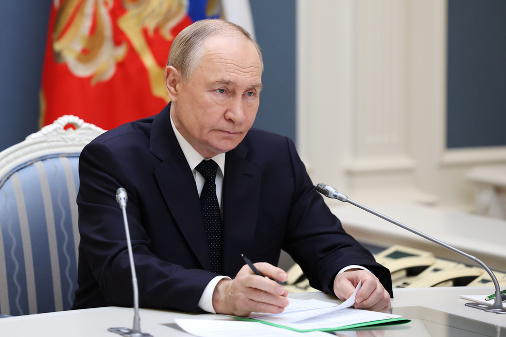 Russia President Vladimir Putin conducts a strategic nuclear forces exercise via videoconference from the Presidential Situation Centre at the Kremlin in Moscow, on Wednesday, Oct. 22, 2025. (Alexander Kazakov, Sputnik, Kremlin Pool Photo via AP)