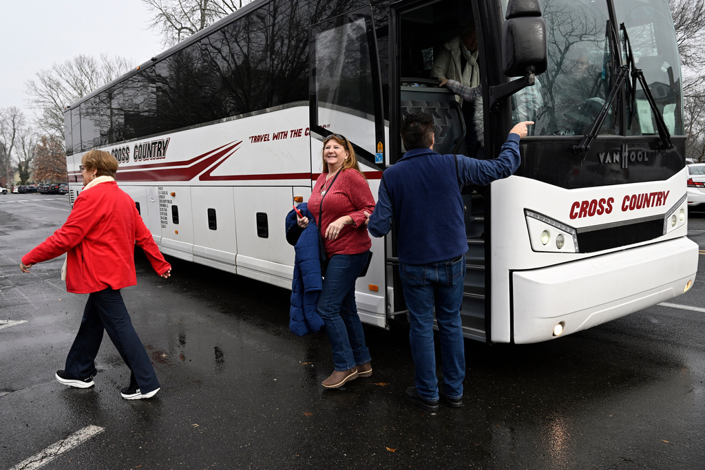 Anita Wilson, a tourist on a weeklong "Hallmark Movie Christmas Tour," arrives in Wethersfield, Conn., Saturday, Dec. 6, 2025, where parts of the Hallmark films "Christmas on Honeysuckle Lane" and "Rediscovering Christmas" were filmed. (AP Photo/Jessica Hill)