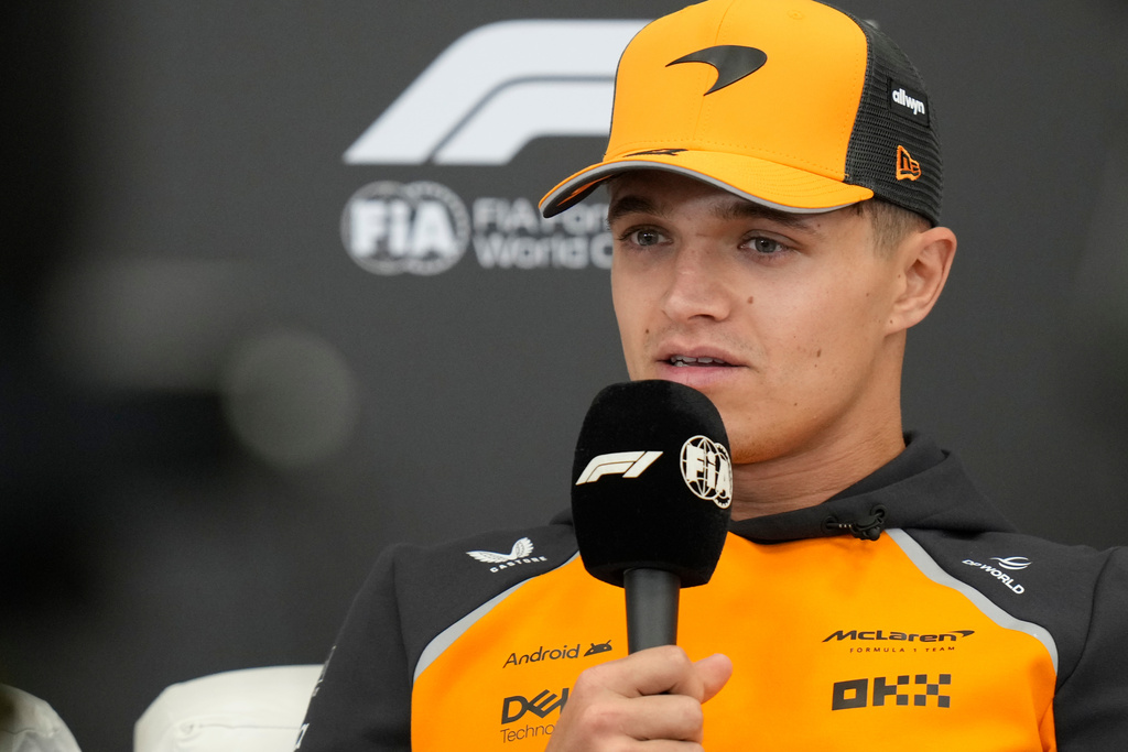 McLaren driver Lando Norris of Britain attends a news conference ahead of the Abu Dhabi Grand Prix in Abu Dhabi, United Arab Emirates, Thursday, Dec. 4, 2025. (AP Photo/Darko Bandic)