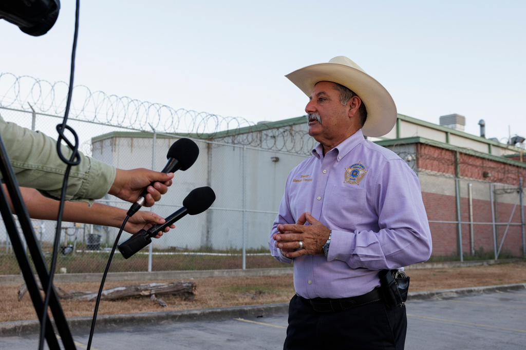 Cameron County Sheriff Manuel Treviño speaks during a news conference outside of the Carrizalez-Rucker Cameron County Detention Center shortly after Immigration and Customs Enforcement officer Christian Castro was released in Brownsville, Texas on Thursday, Aug. 27, 2026. (AP Photo/Michael Gonzalez)