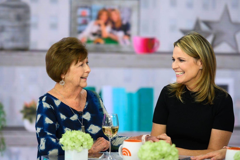 In this image provided by NBCUniversal, Savannah Guthrie, right, her mom Nancy speak, Wednesday, April 17, 2019, in New York. (Nathan Congleton/NBCUniversal via AP)