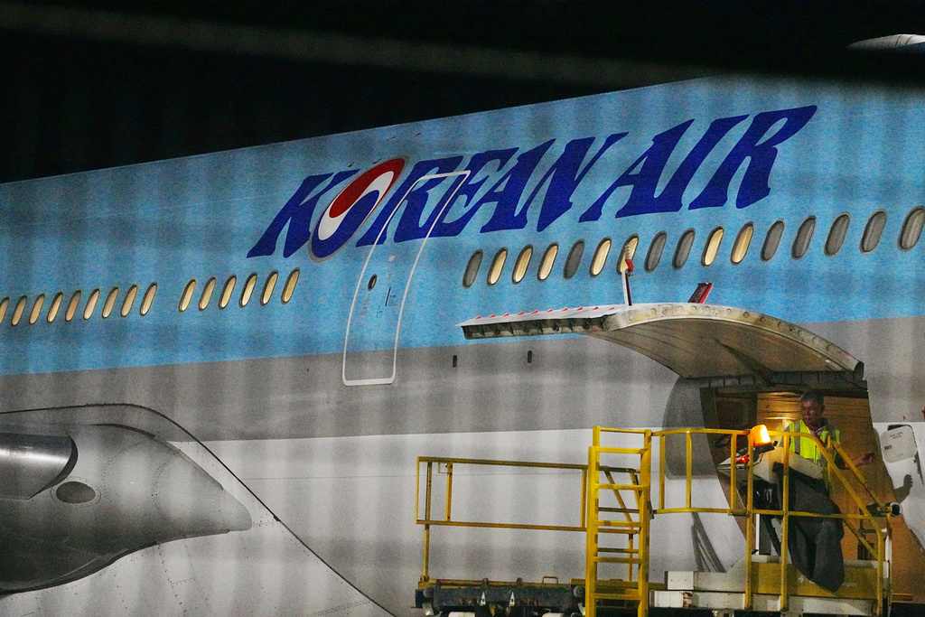 A Korean Air plane is seen at the VIP section for chartered planes at Techo International Airport in Kandal province, Cambodia, Friday, Oct. 17, 2025. (AP Photo/Heng Sinith)