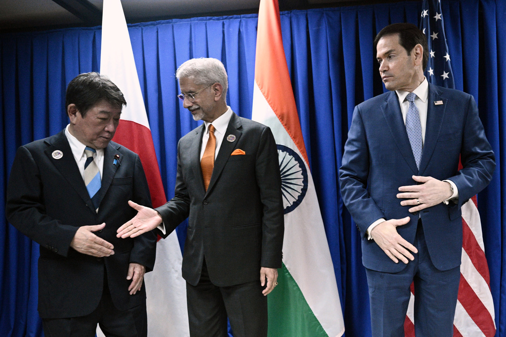 Japan's Foreign Minister Toshimitsu Motegi, left, shakes hands with India's Foreign Minister S. Jaishankar, center, as U.S. Secretary of State Marco Rubio looks on, on the sidelines of the Association of Southeast Asian Nations (ASEAN) Foreign Ministers' Meeting in Pasay city, Metro Manila, Philippines Wednesday, July 22, 2026. (Brendan Smialowski/Pool Photo via AP)