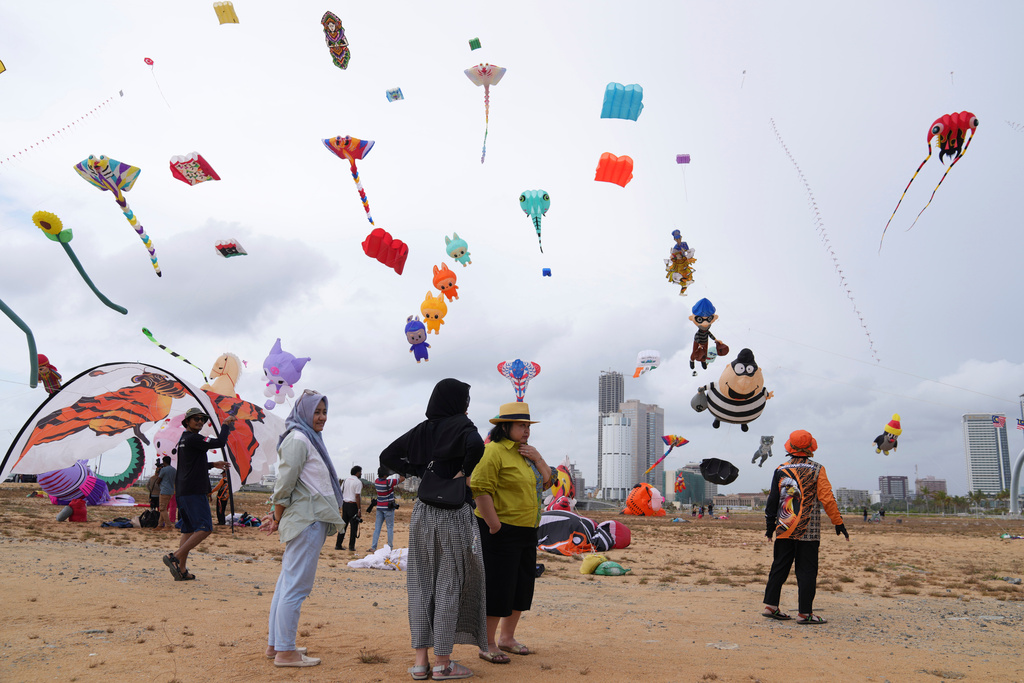 Kites of different shapes and sizes adorn the skies during the Colombo International Kite Festival, in Colombo, Sri Lanka, Saturday, Aug. 23, 2025. (AP Photo/Eranga Jayawardena)