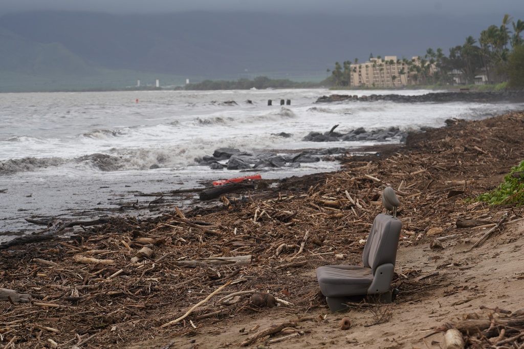 Debris covers a beach in Kihei, Hawaii, Sunday, March 15, 2026. (Eli Pace/The Maui News via AP)