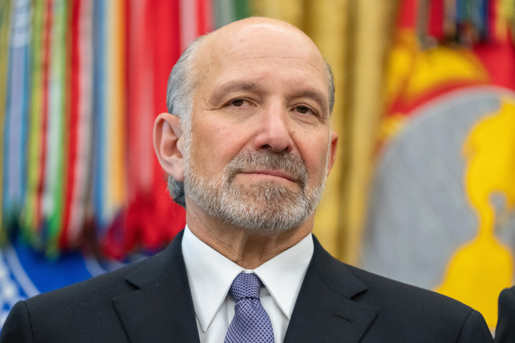 FILE - Commerce Secretary Howard Lutnick attends an event on health care affordability in the Oval Office at the White House, April 23, 2026, in Washington. (AP Photo/Mark Schiefelbein, File)