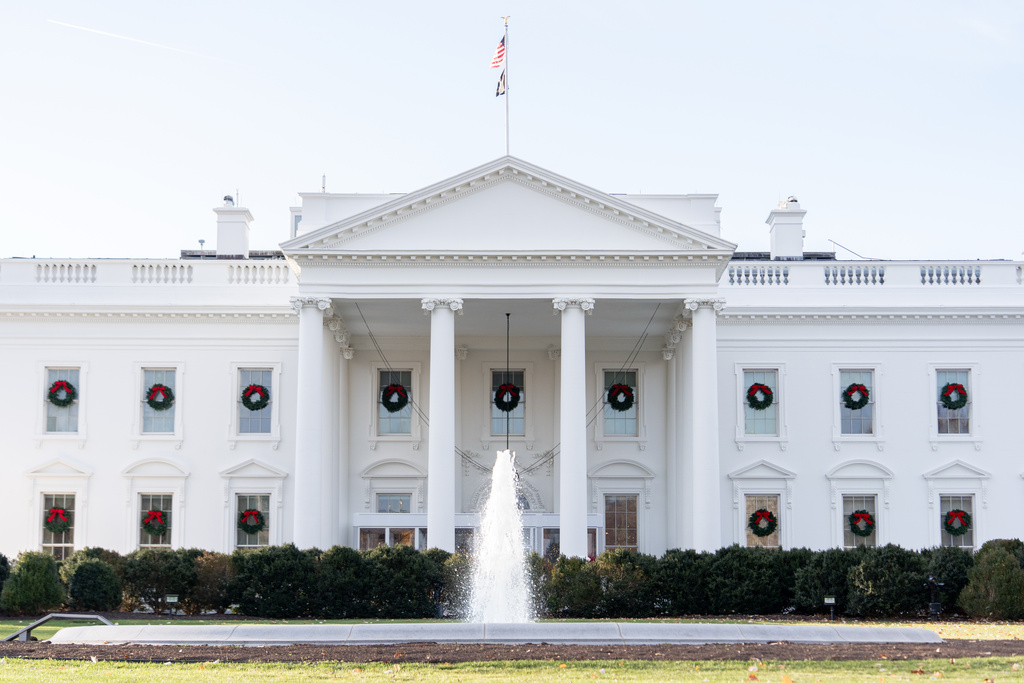 Wreaths decorate the White House, Monday, Dec. 1, 2025, in Washington. (AP Photo/Julia Demaree Nikhinson)