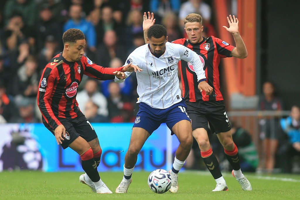 Everton's Iliman Ndiaye is challenged by Bournemouth's Marcus Tavernier, left, and Adrien Truffert during the English Premier League soccer match between Bournemouth and Everton in Bournemouth, England, Saturday Aug. 29, 2026. (Peter Tarry/PA via AP)