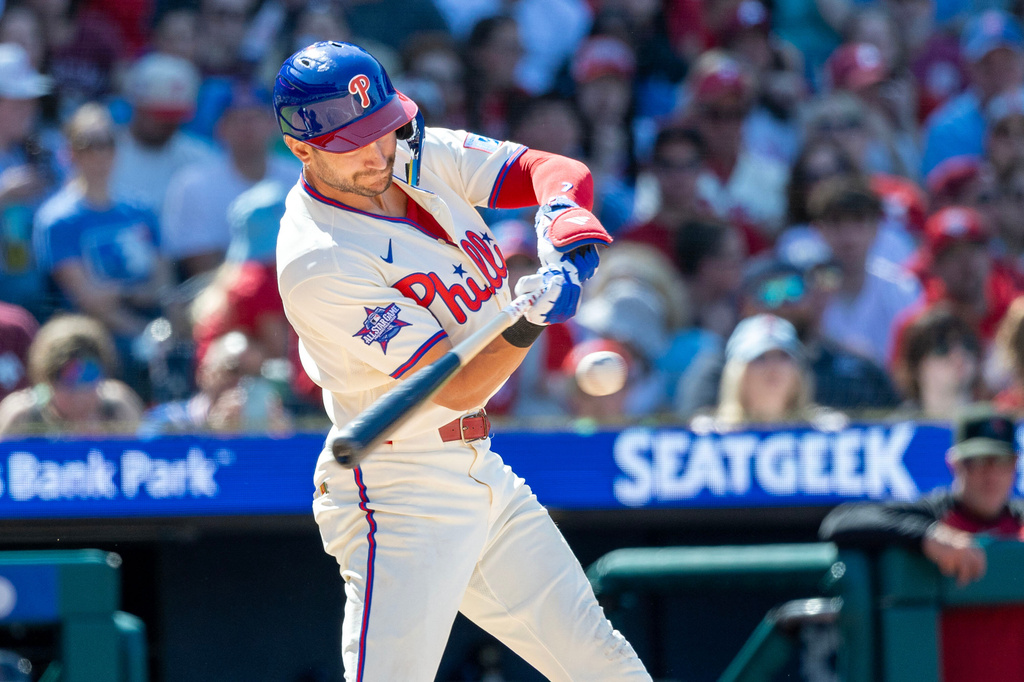 Philadelphia Phillies' Trea Turner hits a home run during the sixth inning of a baseball game against the Arizona Diamondbacks, Sunday, April 12, 2026, in Philadelphia. (AP Photo/Laurence Kesterson)