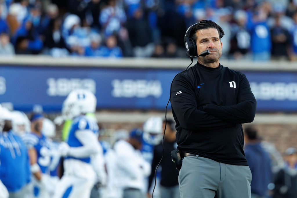 Duke head coach Manny Diaz looks toward he scoreboard during the second half of an NCAA college football game against North Carolina in Durham, N.C., Saturday, Oct. 17, 2026. (AP Photo/Ben McKeown)