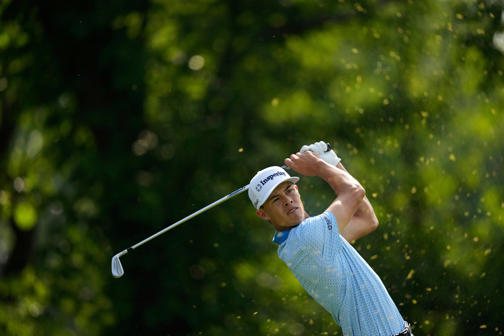 FILE - Johnny Keefer tees off on the 13th hole during the first round of the U.S. Open golf tournament at Oakmont Country Club Thursday, June 12, 2025, in Oakmont, Pa. (AP Photo/Carolyn Kaster, File)