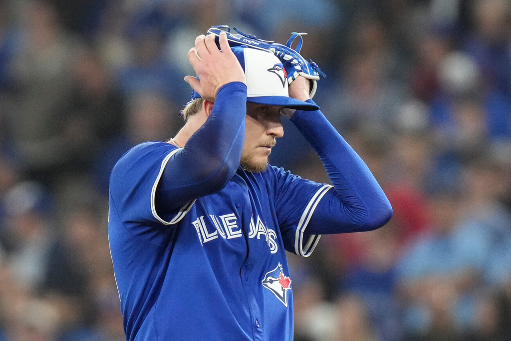 Toronto Blue Jays pitcher Jeff Hoffman (23) reacts after loading the bases during ninth inning MLB baseball action against the Boston Red Sox in Toronto on Thursday September 25, 2025. (Chris Young/The Canadian Press via AP)