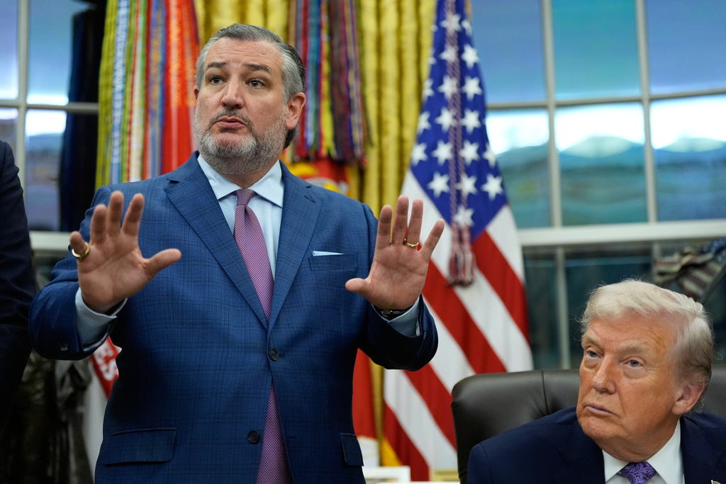 Ted Cruz R-Texas, left, speaks during a signing ceremony regarding AI initiatives with President Donald Trump in the Oval Office of the White House, Thursday, Dec. 11, 2025, in Washington. (AP Photo/Alex Brandon)