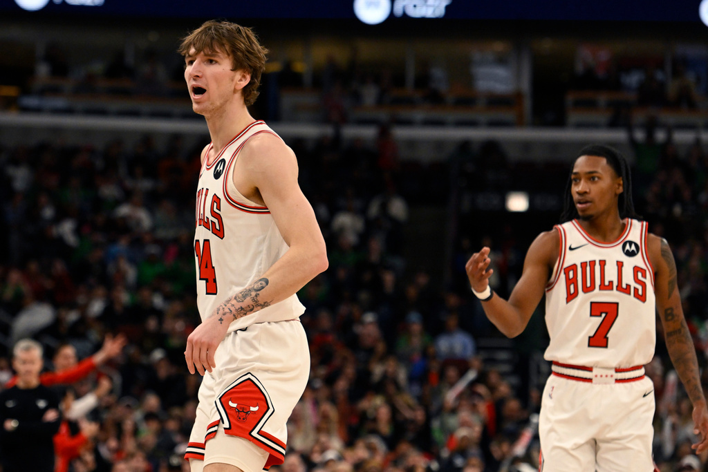 Chicago Bulls' Matas Buzelis (14) yells to the Memphis Grizzlies bench after making a basket during the second half of an NBA basketball game in Chicago, Monday, March 16, 2026. (AP Photo/Paul Beaty)