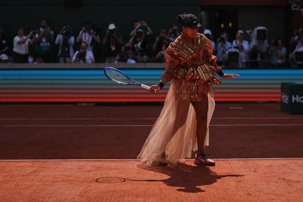 Naomi Osaka of Japan prepares for the third round women's singles tennis match against Iva Jovic of the U.S. at the French Open tennis tournament in Paris, Saturday, May 30, 2026. (AP Photo/Thibault Camus)
