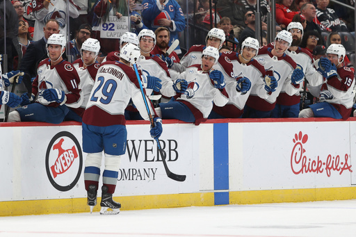 Colorado Avalanche's Nathan MacKinnon reacts with teammates after scoring during the first period of an NHL hockey game against the New Jersey Devils Sunday, Oct. 26, 2025, in Newark, N.J. (AP Photo/Pamela Smith) Colorado Avalanche's Nathan MacKinnon reacts with teammates after scoring during the first period of an NHL hockey game against the New Jersey Devils Sunday, Oct. 26, 2025, in Newark, N.J. (AP Photo/Pamela Smith)