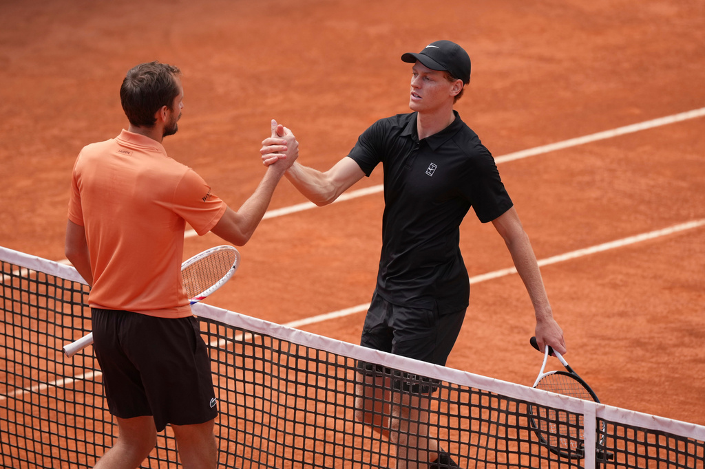 Italy's Jannik Sinner cheer with Daniil Medvedev of Russia after winning their semifinal match at the Italian Open tennis tournament in Rome, Saturday, May 16, 2026. (AP Photo/Andrew Medichini)