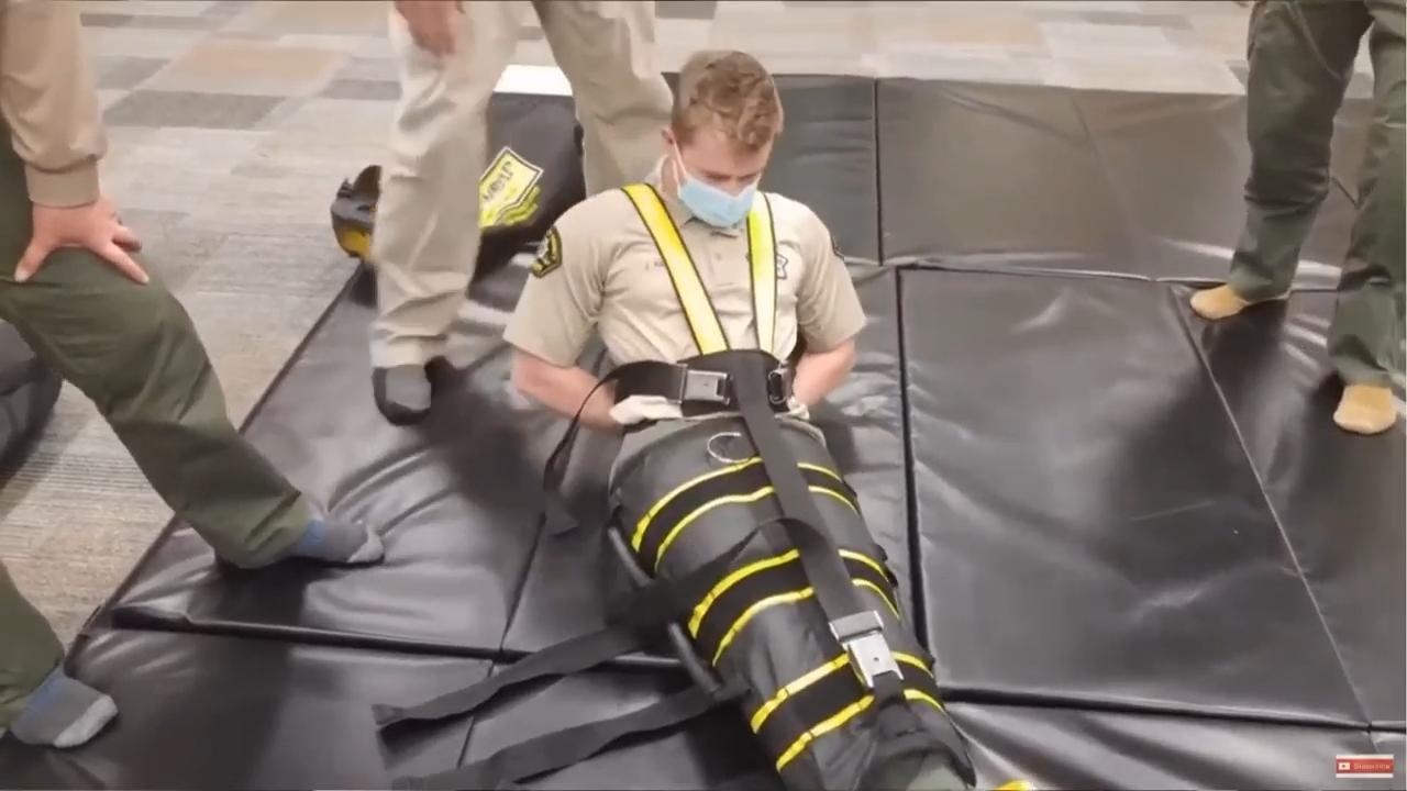 US Immigration and Customs Enforcement officers have been using a full-body restraint device called the WRAP during deportations. That continued despite concerns about safety from a watchdog division of its parent agency, the US Dept. of Homeland Security. (AP Video/Allen G. Breed)