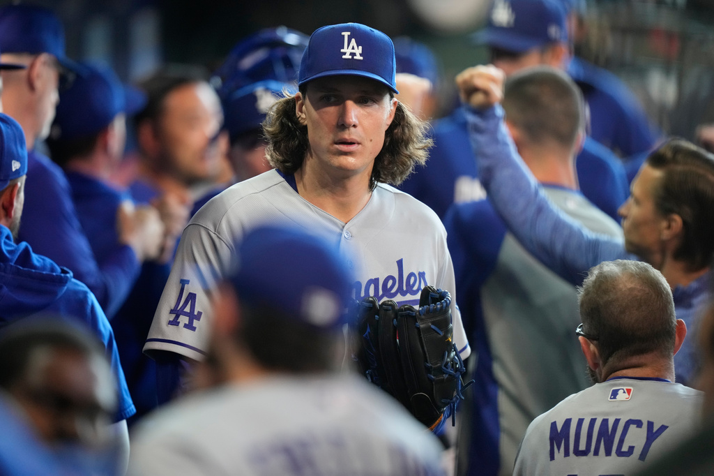 Los Angeles Dodgers starting pitcher Tyler Glasnow enters the dugout before a baseball game against the Houston Astros in Houston, Wednesday, May 6, 2026. (AP Photo/Ashley Landis)