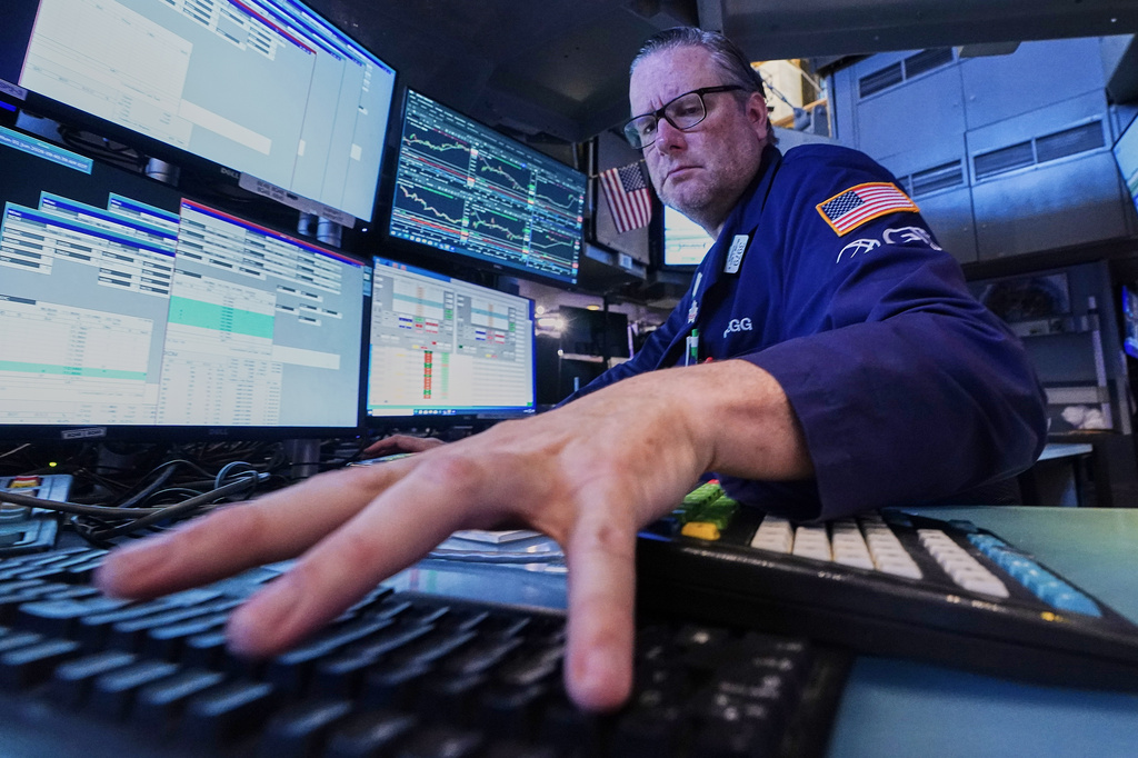 Specialist Gregg Maloney works at his post on the floor of the New York Stock Exchange, Monday, June 1, 2026. (AP Photo/Richard Drew)