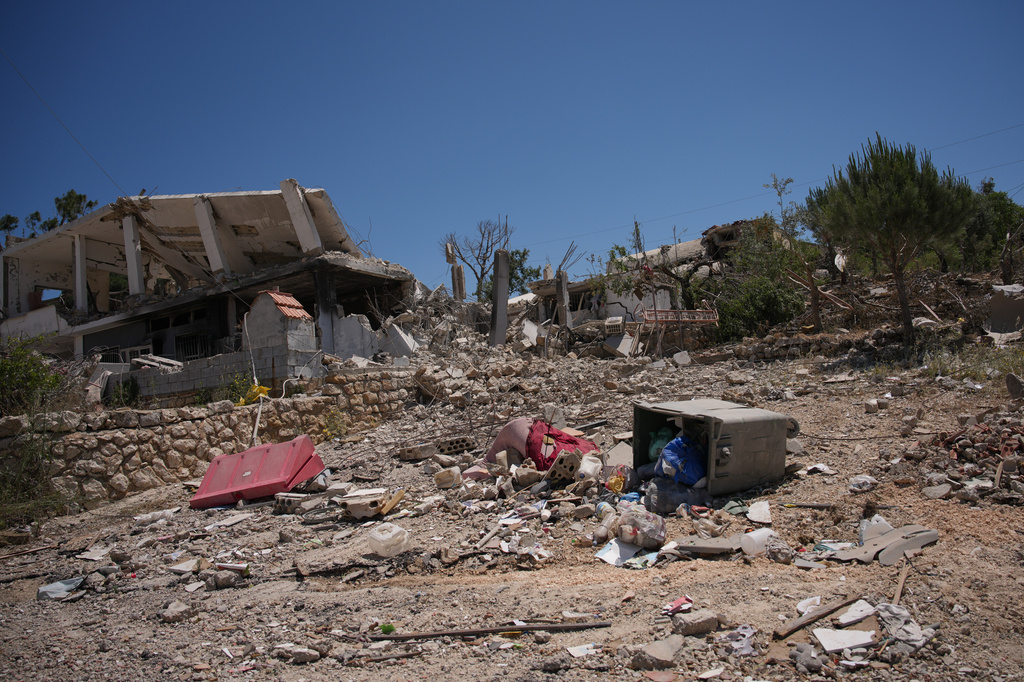 A home destroyed during the war between Israel and Hezbollah lies in ruins in the village of Dibbine, southeast Lebanon, Wednesday, June 10, 2026. (AP Photo/Hassan Ammar)
