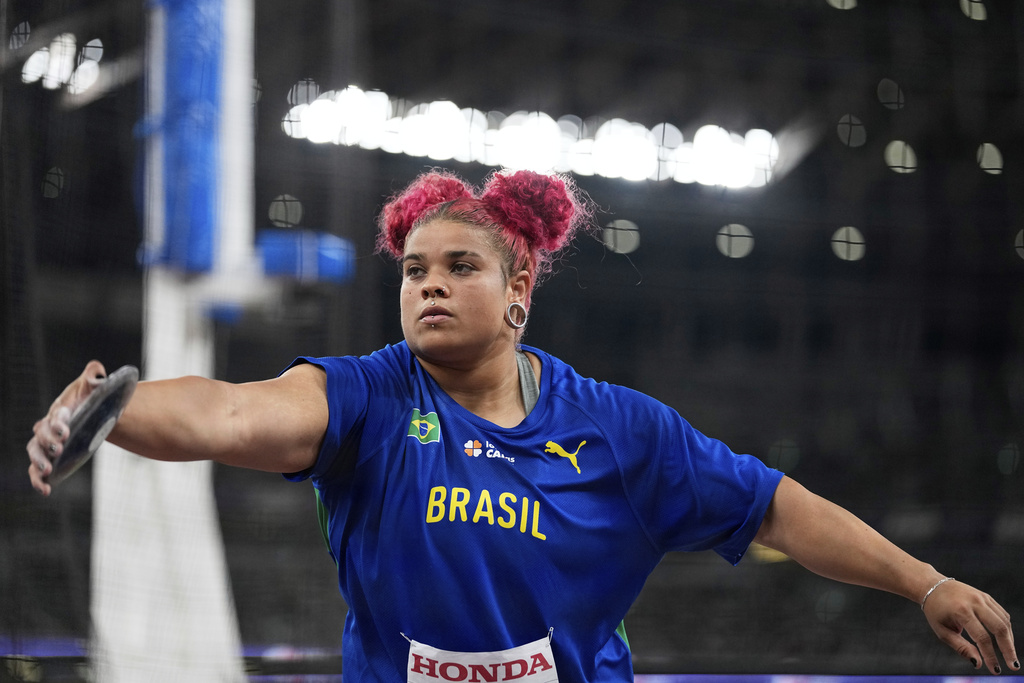 Brazil's Izabela Da Silva makes an attempt in the women's discus throw final at the World Athletics Championships in Tokyo, Sunday, Sept. 14, 2025. (AP Photo/Matthias Schrader)
