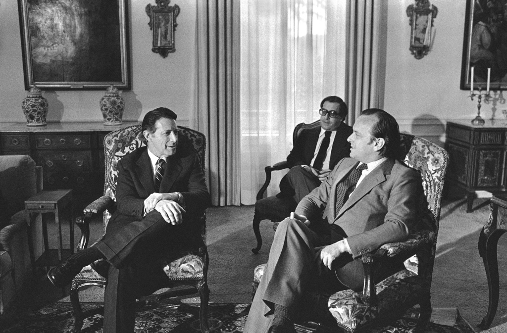 FILE -United State Secretary of Defense Caspar Weinberger, left, makes a point during talks with Portuguese Prime Minister Francisco Pinto Balsemao, at right, in Lisbon on May 13, 1981. (AP Photo/Rebelo, File)