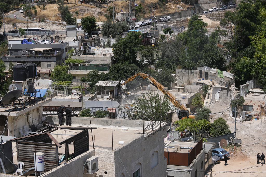 Israeli authorities demolish a Palestinian home in the Silwan neighborhood of east Jerusalem, May 25, 2026. (AP Photo/Mahmoud Illean)
