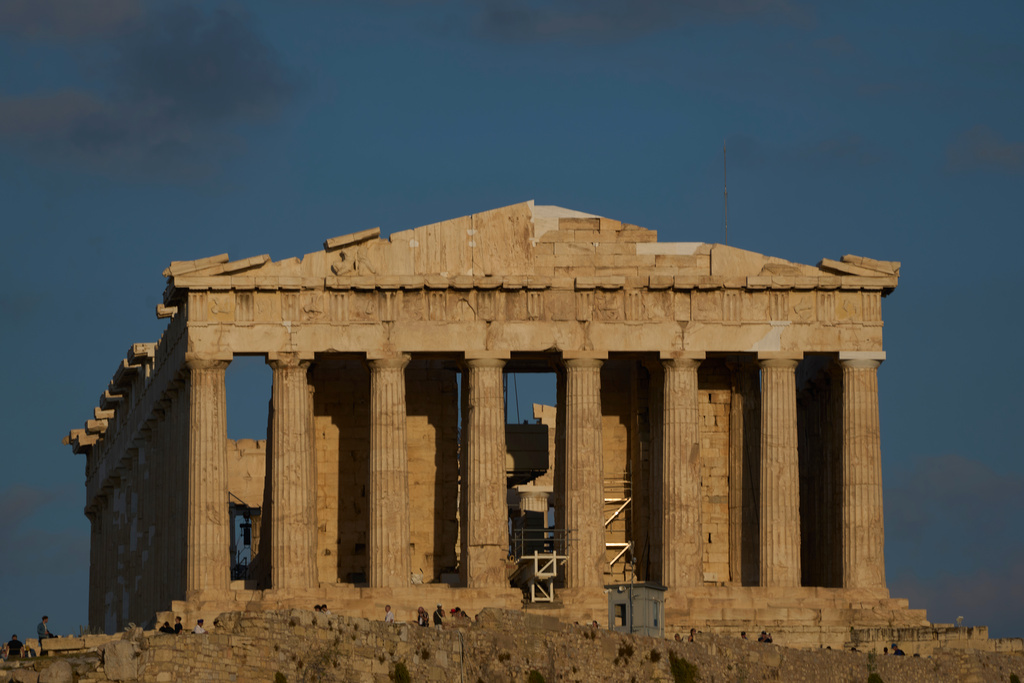 The 5th century B.C. Parthenon temple stands free of scaffolding on the Acropolis hill in Athens, Friday, Oct. 10, 2025, after the removal of restoration structures that had covered parts of the ancient monument for decades.(AP Photo/Petros Giannakouris)
